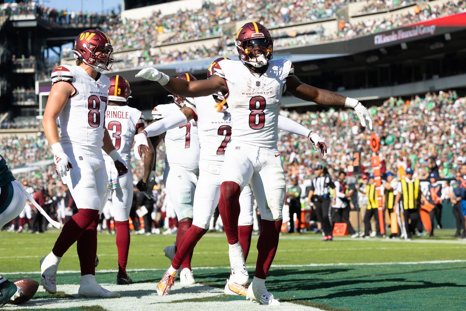 Washington Commanders running back Brian Robinson Jr. (8) celebrates his touchdown against the Philadelphia Eagles during the fourth quarter at Lincoln Financial Field.